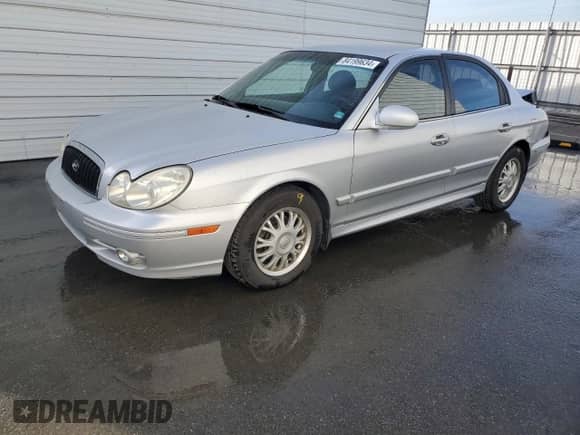 2004 Hyundai Sonata z VIN KMHWF25S04A039620, wystawiony jako Copart lot #84199634 z przebiegiem 227 690 mil mil oraz Szkoda całkowita • Salvage title. Historia ofert i sprzedaży dostępna na DreamBid. Obrazek 1.