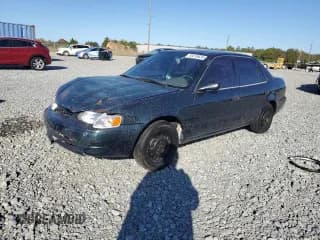 ✅ 1999 Toyota Corolla LE • VIN: 1NXBR12E6XZ144874 • Lot: 93218635. Listed on Copart with Not provided. Free auction sales archive from the USA and detailed vehicle history report at DreamBid. Image 1.