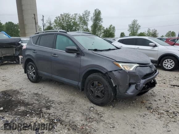 ✅ 2017 Toyota RAV4 LE • VIN: 2T3BFREV2HW564465 • Lot: 57801105. Listed on Copart with 96,531 mi. Free auction sales archive from the USA and detailed vehicle history report at DreamBid. Image 4.