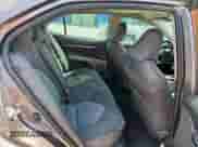 2019 Toyota Camry LE z VIN 4T1B11HK7KU815143, wystawiony jako Copart lot #69475835 z przebiegiem 122 992 mil mil oraz Szkoda całkowita • Salvage title. Historia ofert i sprzedaży dostępna na DreamBid. Obrazek 10.