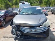 ✅ 2018 Hyundai Santa Fe 2.4L • VIN: 5NMZTDLB4JH107766 • Лот: 43043034. Опубликован ранее на IAAI с пробегом 93 208 миль. Бесплатный доступ к архиву аукционных продаж из США и подробный отчёт об истории автомобиля на DreamBid. Изображение 13.