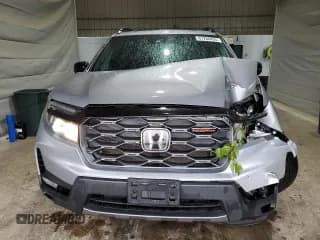 ✅ 2022 Honda Passport TrailSport • VIN: 5FNYF8H68NB011264 • Lot: 67280435. Wystawiony na Copart z przebiegiem 61 624 mil. Bezpłatny archiwum sprzedaży aukcyjnych z USA i szczegółowy raport historii pojazdu na DreamBid. Zdjęcie 5.