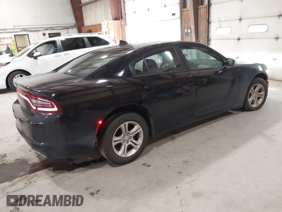 ✅ 2023 Dodge Charger SXT • VIN: 2C3CDXBG8PH529792 • Lot: 43158299. Listed on IAAI with 46,499 mi. Free auction sales archive from the USA and detailed vehicle history report at DreamBid. Image 4.