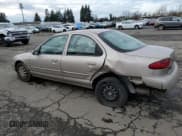 ✅ 1996 Ford Contour • VIN: 3FALP6535TM129390 • Лот: 73338064. Опубликован ранее на Copart с пробегом 87 588 миль. Бесплатный доступ к архиву аукционных продаж из США и подробный отчёт об истории автомобиля на DreamBid. Изображение 2.