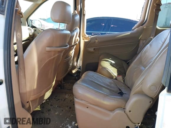 ✅ 1999 Chrysler Town & Country LX • VIN: 1C4GP54L0XB898500 • Lot: 43650504. Listed on IAAI with 305,025 mi. Free auction sales archive from the USA and detailed vehicle history report at DreamBid. Image 8.