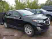 2018 Chevrolet Equinox LT z VIN 2GNAXJEV0J6142715, wystawiony jako IAAI lot #43262312 z przebiegiem 57 864 mil mil oraz . Historia ofert i sprzedaży dostępna na DreamBid. Obrazek 1.