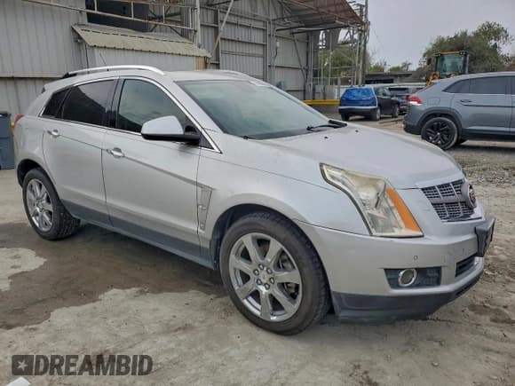 ✅ 2012 Cadillac SRX Performance Collection • VIN: 3GYFNBE36CS511407 • Lot: 95206575. Listed on Copart with 156,870 mi. Free auction sales archive from the USA and detailed vehicle history report at DreamBid. Image 4.