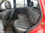 ✅ 2001 Jeep Grand Cherokee Laredo • VIN: 1J4GX48S21C575542 • Lot: 51822055. Listed on Copart with 228,861 mi. Free auction sales archive from the USA and detailed vehicle history report at DreamBid. Image 11.