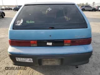 ✅ 1994 Geo Metro • VIN: 2C1MR2467R6780100 • Lot: 45597135. Listed on Copart with 100,000 mi. Free auction sales archive from the USA and detailed vehicle history report at DreamBid. Image 6.