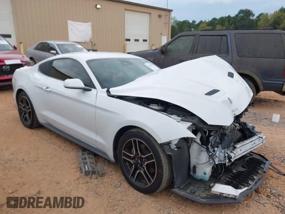 ✅ 2021 Ford Mustang EcoBoost • VIN: 1FA6P8TH9M5101140 • Lot: 43309485. Listed on IAAI with 69,861 mi. Free auction sales archive from the USA and detailed vehicle history report at DreamBid. Image 1.