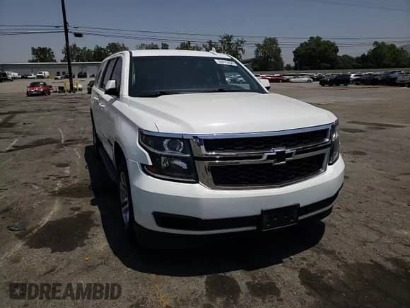 2019 Chevrolet Suburban LT with VIN 1GNSCHKCXKR207233, listed as a Copart auction lot 55410464 with 107,500 mi miles and Salvage title. Bid and sale history available at DreamBid. Image 11.