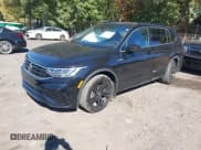 ✅ 2024 Volkswagen Tiguan SE R-Line Black • VIN: 3VVCB7AX9RM160417 • Лот: 43494577. Опубликован ранее на IAAI с пробегом 36 019 миль. Бесплатный доступ к архиву аукционных продаж из США и подробный отчёт об истории автомобиля на DreamBid. Изображение 2.