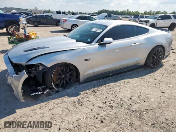 2015 Ford Mustang GT Premium with VIN 1FA6P8CF6F5412879, listed as a Copart auction lot 71130235 with 82,389 mi miles and Salvage title. Bid and sale history available at DreamBid. Image 1.