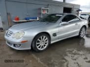 ✅ 2007 Mercedes-Benz SL 550 • VIN: WDBSK71F27F124405 • Lot: 84946224. Listed on Copart with 119,606 mi. Free auction sales archive from the USA and detailed vehicle history report at DreamBid. Image 1.