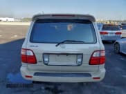 ✅ 2003 Lexus LX 470 • VIN: JTJHT00W033528099 • Lot: 94275515. Wystawiony na Copart z przebiegiem 395 291 mil. Bezpłatny archiwum sprzedaży aukcyjnych z USA i szczegółowy raport historii pojazdu na DreamBid. Zdjęcie 6.