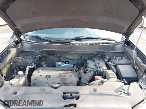 2014 Mitsubishi Outlander ES z VIN 4A4AR3AU0EE005229, wystawiony jako IAAI lot #43621061 z przebiegiem 147 459 mil mil oraz . Historia ofert i sprzedaży dostępna na DreamBid. Obrazek 10.