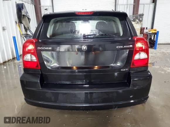 2010 Dodge Caliber SXT with VIN 1B3CB4HA0AD602517, listed as a Copart auction lot 85323475 with 40,840 mi miles and Salvage title. Bid and sale history available at DreamBid. Image 6.