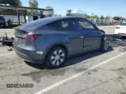 ✅ 2023 Tesla Model Y Long Range • VIN: 7SAYGAEE6PF637837 • Лот: 56227545. Опубликован ранее на Copart с пробегом 19 646 миль. Бесплатный доступ к архиву аукционных продаж из США и подробный отчёт об истории автомобиля на DreamBid. Изображение 3.