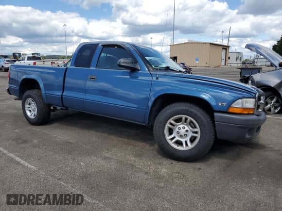 2004 Dodge Dakota with VIN 1D7GL12K84S676674, listed as a Copart auction lot 70167545 with 62,177 mi miles and Salvage title. Bid and sale history available at DreamBid. Image 4.