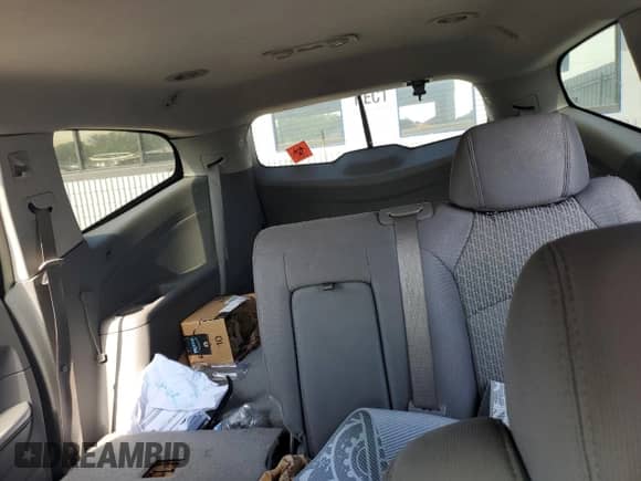 2009 Chevrolet Traverse LS z VIN 1GNER13D59S110681, wystawiony jako Copart lot #68293895 z przebiegiem Nie podano mil oraz Czysty tytuł • Clean title. Historia ofert i sprzedaży dostępna na DreamBid. Obrazek 10.