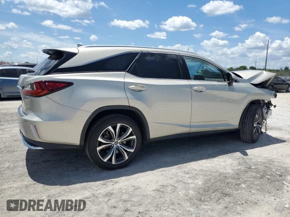 ✅ 2020 Lexus RX 350L • VIN: JTJHZKEA1L2017739 • Lot: 65697825. Listed on Copart with 33,413 mi. Free auction sales archive from the USA and detailed vehicle history report at DreamBid. Image 3.