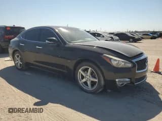 ✅ 2015 Infiniti Q70 • VIN: JN1BY1AP2FM540716 • Лот: 74594234. Опубликован ранее на Copart с пробегом 194 367 миль. Бесплатный доступ к архиву аукционных продаж из США и подробный отчёт об истории автомобиля на DreamBid. Изображение 4.