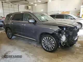2023 Hyundai Palisade Calligraphy с VIN KM8R74GE7PU611850, выставлен на аукционе Copart как лот 63023794 с пробегом 36 259 миль миль и Списание • Salvage title. История ставок и продаж доступна на DreamBid. Изображение 4.