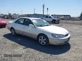 ✅ 1999 Lexus ES 300 • VIN: JT8BF28GXX0225751 • Lot: 43591203. Listed on IAAI with 241,422 mi. Free auction sales archive from the USA and detailed vehicle history report at DreamBid. Image 1.