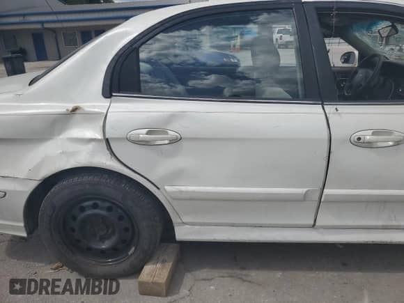 2005 Hyundai Sonata GL with VIN KMHWF25S25A130227, listed as a Copart auction lot 69933705 with 149,478 mi miles and Salvage title. Bid and sale history available at DreamBid. Image 10.