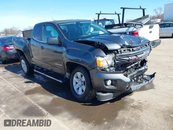 ✅ 2016 GMC Canyon 2WD SLE • VIN: 1GTH5CE36G1180209 • Lot: 41604746. Listed on IAAI with 112,963 mi. Free auction sales archive from the USA and detailed vehicle history report at DreamBid. Image 1.