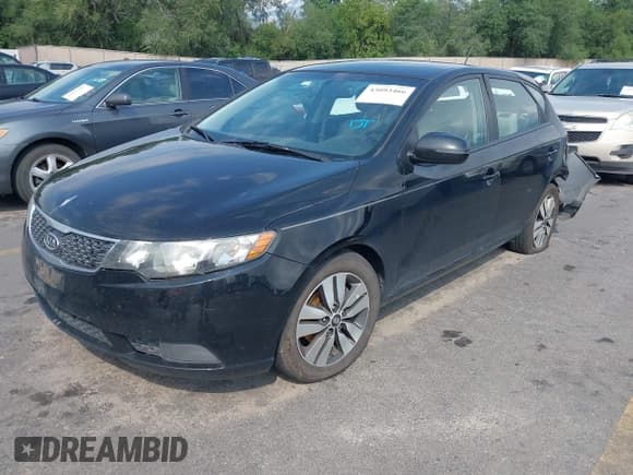 ✅ 2013 Kia Forte EX • VIN: KNAFU5A20D5672996 • Lot: 43093466. Listed on IAAI with 125,922 mi. Free auction sales archive from the USA and detailed vehicle history report at DreamBid. Image 2.
