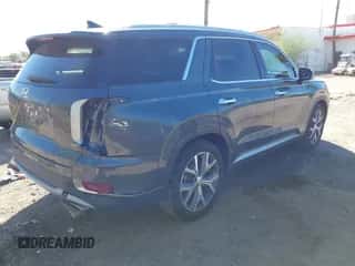 2021 Hyundai Palisade SEL z VIN KM8R44HE0MU251971, wystawiony jako IAAI lot #43354500 z przebiegiem 101 877 mil mil oraz . Historia ofert i sprzedaży dostępna na DreamBid. Obrazek 4.