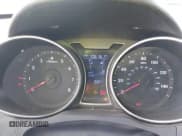 ✅ 2013 Hyundai Veloster w/Black Int • VIN: KMHTC6AD4DU153855 • Lot: 41589006. Wystawiony na IAAI z przebiegiem 106 161 mil. Bezpłatny archiwum sprzedaży aukcyjnych z USA i szczegółowy raport historii pojazdu na DreamBid. Zdjęcie 7.