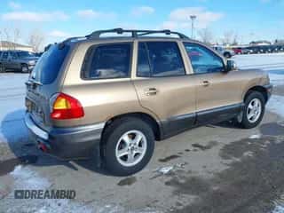 2002 Hyundai Santa Fe GLS z VIN KM8SC73D62U316002, wystawiony jako IAAI lot #41249855 z przebiegiem Nie podano mil oraz . Historia ofert i sprzedaży dostępna na DreamBid. Obrazek 4.