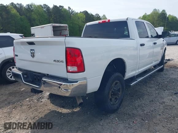 ✅ 2018 Ram 2500 Tradesman • VIN: 3C6UR5CJ3JG300872 • Lot: 42001722. Listed on IAAI with 127,543 mi. Free auction sales archive from the USA and detailed vehicle history report at DreamBid. Image 4.