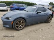 ✅ 2021 Mazda MX-5 Miata Grand Touring • VIN: JM1NDAM73M0452571 • Lot: 80865215. Listed on Copart with 54,448 mi. Free auction sales archive from the USA and detailed vehicle history report at DreamBid. Image 1.