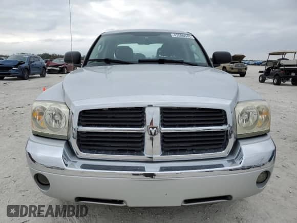 2006 Dodge Dakota Laramie with VIN 1D7HE58N06S641184, listed as a Copart auction lot 43596945 with 173,809 mi miles and Salvage title. Bid and sale history available at DreamBid. Image 5.