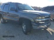 ✅ 2002 Chevrolet Tahoe LT • VIN: 1GNEK13Z42J114572 • Lot: 43765988. Listed on IAAI with 257,495 mi. Free auction sales archive from the USA and detailed vehicle history report at DreamBid. Image 1.