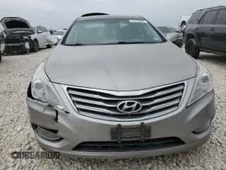 ✅ 2013 Hyundai Azera • VIN: KMHFH4JG5DA327155 • Lot: 51076905. Wystawiony na Copart z przebiegiem 228 236 mil mil. Skorzystaj z bezpłatnego archiwum sprzedaży aukcyjnych z USA i zobacz szczegółowy raport historii pojazdu na DreamBid. Zdjęcie 5.