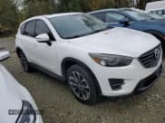 ✅ 2016 Mazda CX-5 Grand Touring • VIN: JM3KE4DY1G0803211 • Лот: 89537495. Опубликован ранее на Copart с пробегом 255 646 миль. Бесплатный доступ к архиву аукционных продаж из США и подробный отчёт об истории автомобиля на DreamBid. Изображение 4.