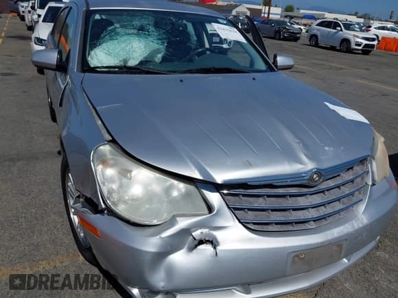 ✅ 2007 Chrysler Sebring Limited • VIN: 1C3LC66K07N535704 • Lot: 42415624. Wystawiony na IAAI z przebiegiem 39 403 mil. Bezpłatny archiwum sprzedaży aukcyjnych z USA i szczegółowy raport historii pojazdu na DreamBid. Zdjęcie 6.