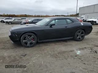 ✅ 2012 Dodge Challenger SXT • VIN: 2C3CDYAG8CH196303 • Lot: 90491975. Wystawiony na Copart z przebiegiem 126 383 mil. Bezpłatny archiwum sprzedaży aukcyjnych z USA i szczegółowy raport historii pojazdu na DreamBid. Zdjęcie 1.