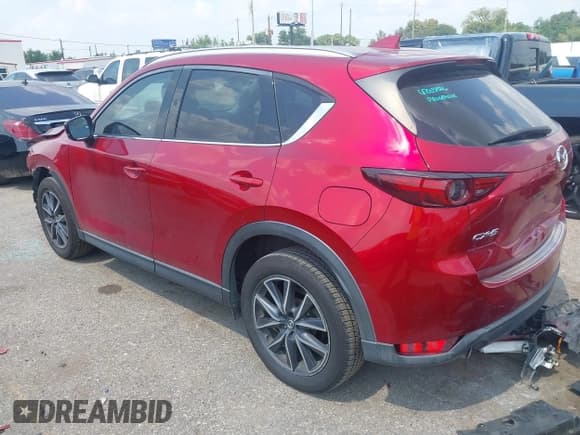 ✅ 2018 Mazda CX-5 Grand Touring • VIN: JM3KFADM0J1391986 • Lot: 43229848. Listed on IAAI with 87,989 mi. Free auction sales archive from the USA and detailed vehicle history report at DreamBid. Image 3.