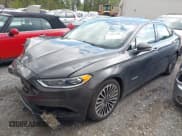 ✅ 2017 Ford Fusion Hybrid Titanium • VIN: 3FA6P0RU5HR301716 • Lot: 42017600. Listed on IAAI with 147,232 mi. Free auction sales archive from the USA and detailed vehicle history report at DreamBid. Image 2.