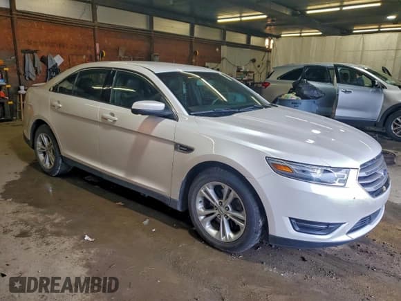 ✅ 2014 Ford Taurus SEL • VIN: 1FAHP2E84EG108344 • Lot: 94135635. Listed on Copart with 96,343 mi. Free auction sales archive from the USA and detailed vehicle history report at DreamBid. Image 4.