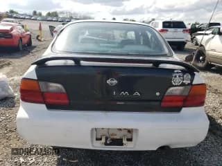 ✅ 1996 Nissan Maxima GXE • VIN: JN1CA21D7TT743798 • Lot: 72624734. Listed on Copart with 125,889 mi. Free auction sales archive from the USA and detailed vehicle history report at DreamBid. Image 6.