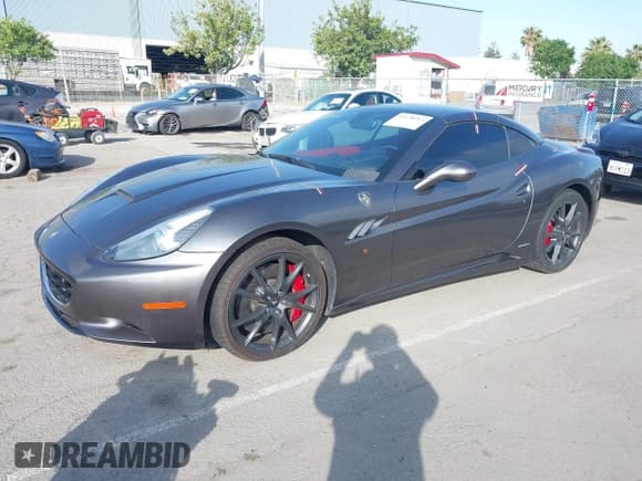 ✅ 2010 Ferrari California • VIN: ZFF65LJA7A0168421 • Lot: 42178913. Listed on IAAI with 57,276 mi. Free auction sales archive from the USA and detailed vehicle history report at DreamBid. Image 2.