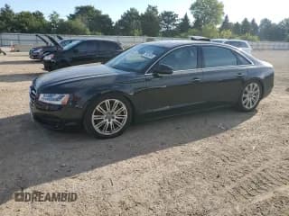 ✅ 2015 Audi A8 4.0T • VIN: WAU32AFD2FN023862 • Lot: 70026995. Wystawiony na Copart z przebiegiem 87 013 mil. Bezpłatny archiwum sprzedaży aukcyjnych z USA i szczegółowy raport historii pojazdu na DreamBid. Zdjęcie 1.