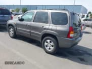 ✅ 2003 Mazda Tribute LX • VIN: 4F2YZ04193KM08890 • Лот: 42158385. Опубликован ранее на IAAI с пробегом 282 314 миль. Бесплатный доступ к архиву аукционных продаж из США и подробный отчёт об истории автомобиля на DreamBid. Изображение 3.