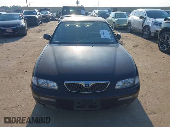 ✅ 1999 Mazda Millenia • VIN: JM1TA2217X1512130 • Lot: 43084659. Wystawiony na IAAI z przebiegiem 82 008 mil. Bezpłatny archiwum sprzedaży aukcyjnych z USA i szczegółowy raport historii pojazdu na DreamBid. Zdjęcie 11.